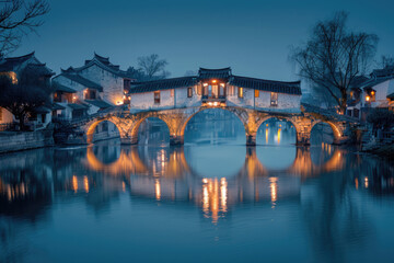 Obraz premium Chinese ancient town at night, ancient stone bridges and residential buildings