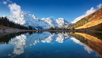 Snow-Capped Alps Under a Clear Blue Sky, Showcasing Europe's Majestic Mountains