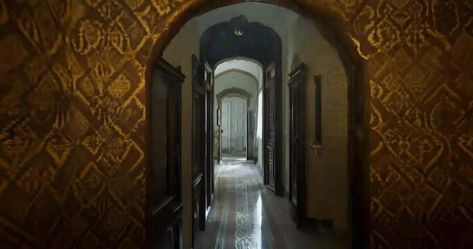 The camera slowly moves down a long Inside haunted house Halloween concept