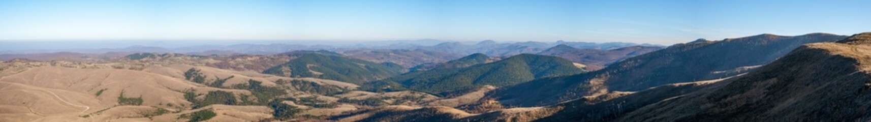 Obraz premium Panoramic view of the rural landscape of Zlatibor, Serbia on a sunny day 