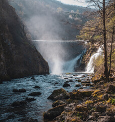 River dam waterfall in autumn