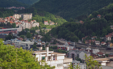 View of the small town with high-rise buildings and streets