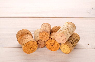 Several wine corks on a wooden table, macro.