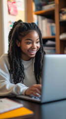 Afro-American Female Student Smiling and Engaged in E-Learning, Online Education, Remote Learning, and Digital Education at Home, Studying for University and Bootcamp Courses.