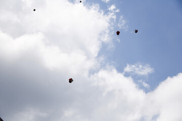 A paper balloon flying into the sky with a wish