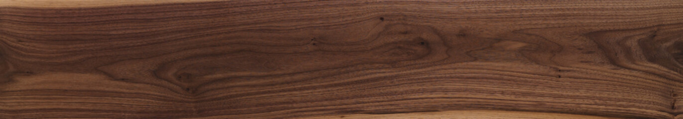 Black walnut wood texture of long solid board untreated