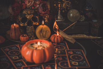 Mystical scene with candles. Fate prediction. Halloween concept, details and décor for home