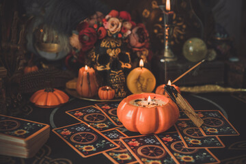 Mystical scene with candles. Fate prediction. Halloween concept, details and décor for home