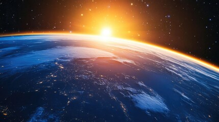 Obraz premium Sunrise illuminates the blue planet Earth as viewed from space