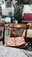 Vintage Wooden Chair With Floral Cushion Outdoor Rustic Setting