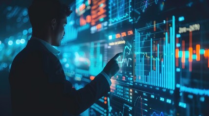 Businessman analyzing data on large screen with graphs and charts.