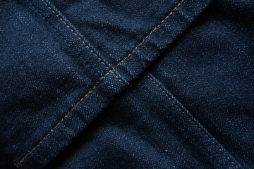 Naklejka premium Raw denim with seams texture background