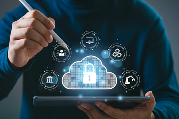 Man using tablet with cloud network and cybersecurity concepts. Data protection, cloud storage, and digital transformation.