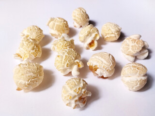 Closeup of popcorn kernels on the table. 
