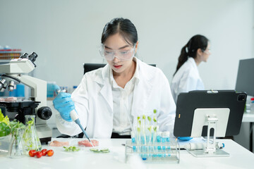 Team Microbiologists Analyzing Molecular Samples in Advanced Food Science Laboratory, Dietitian...
