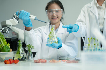Team Microbiologists Analyzing Molecular Samples in Advanced Food Science Laboratory, Dietitian food and medicine.