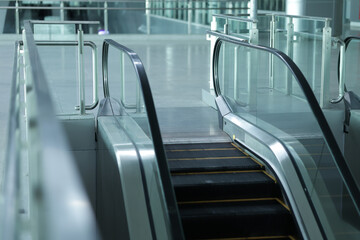 Escalators in public areas. Escalators for convenient travel up and down between floors.