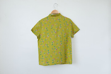  flower print on woman blouse isolated on white background.