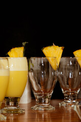 Refreshing piñacolada cocktails with black background. Copy space. Black friday.