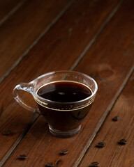 cup of coffee on wooden table
