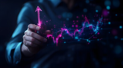 A hand points at an upward-trending chart, symbolizing growth in a market or industry