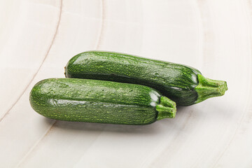Raw green ripe zucchini vegetable