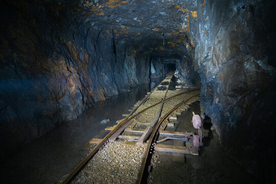 Railway switch in flooded abandoned graphite mine
