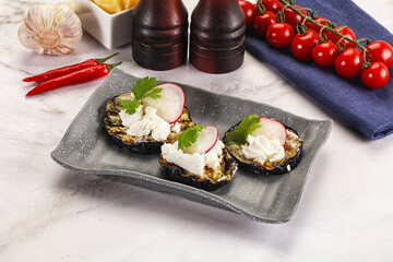 Grilled eggplant with cheese and radish