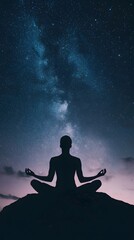 Silhouette of a person meditating under a starry night sky.
