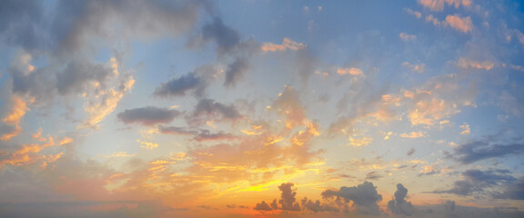 Sunset sky nature background. Summer sunrise with colorful cloud and sun, evening landscape