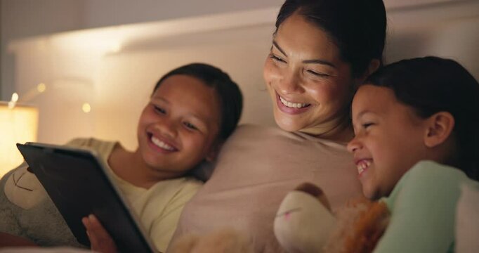 Happy kids, mother and laugh with tablet in bed at night for elearning, video games or reading ebook at home. Mom, girl children and watch funny cartoon, streaming multimedia or digital bedtime story