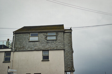 Weathered Building Under Cloudy Sky in St Ives, Cornwall, UK