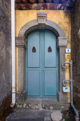 Old doors in the town of Linguaglossa, Linguagrossa, Catania, Sicily, Italy