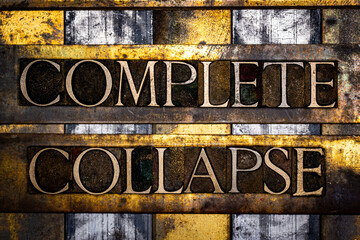 Complete Collapse text in real authentic typeset letters on vintage textured silver grunge copper and gold background