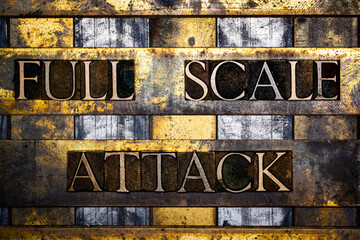 Full Scale Attack text in real authentic typeset letters on vintage textured silver grunge copper and gold background