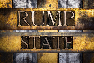 Rump State text with barbed wire in real authentic typeset letters on vintage textured silver grunge copper and gold background 