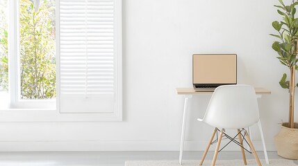 Modern home office setup with a sleek laptop, comfortable chair, and natural lighting, copy space for text on the side, deep depth of field
