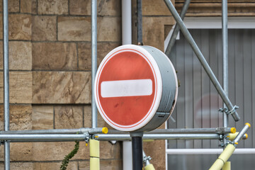 No Entry Sign with Scaffolding Background