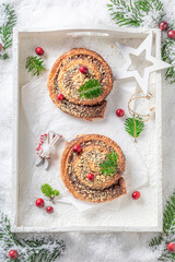 Homemade and hot cinnamon yeast as christmas dessert.