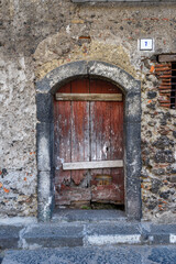 Old doors in the town of Linguaglossa, Linguagrossa, Catania, Sicily, Italy