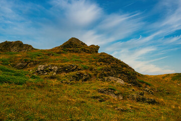 Scenic Rocky Hill Under Blue Sky in Tintagel, Cornwall, UK