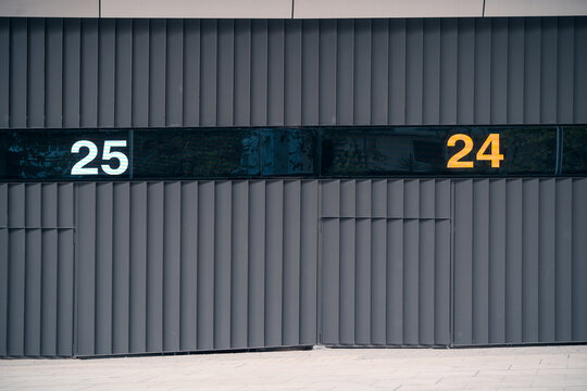 Modern facade with numerical signage in Madrid's AZCA