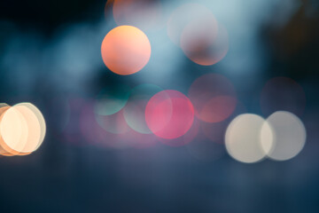 Abstract colorful bokeh lights on a dark background