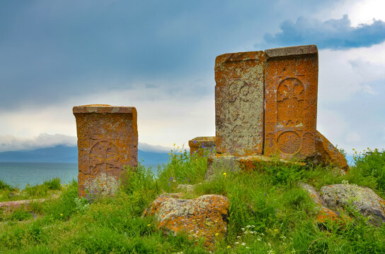old carved stones (khachkars) near Hayravank monastery on Sevan Lake shore (Gegharkunik Province, Armenia)   