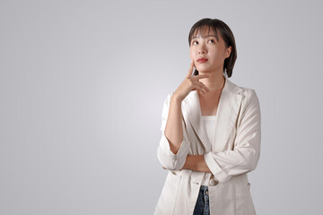 Portrait of asian businesswoman thinking isolated on white background