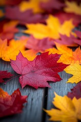 Obraz premium Autumn Leaves on Wooden Surface