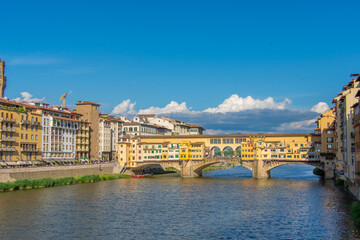 Naklejka premium View of the famous Ponte Vecchio over the Arno river in the city of Florence in Italy.