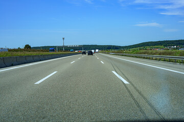 Automobile traffic of vehicles on a motorway.