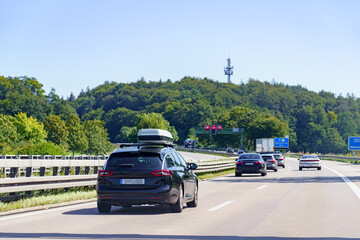 Automobile traffic of vehicles on a motorway.