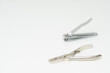 Two types of nail clippers plier type and compound lever type